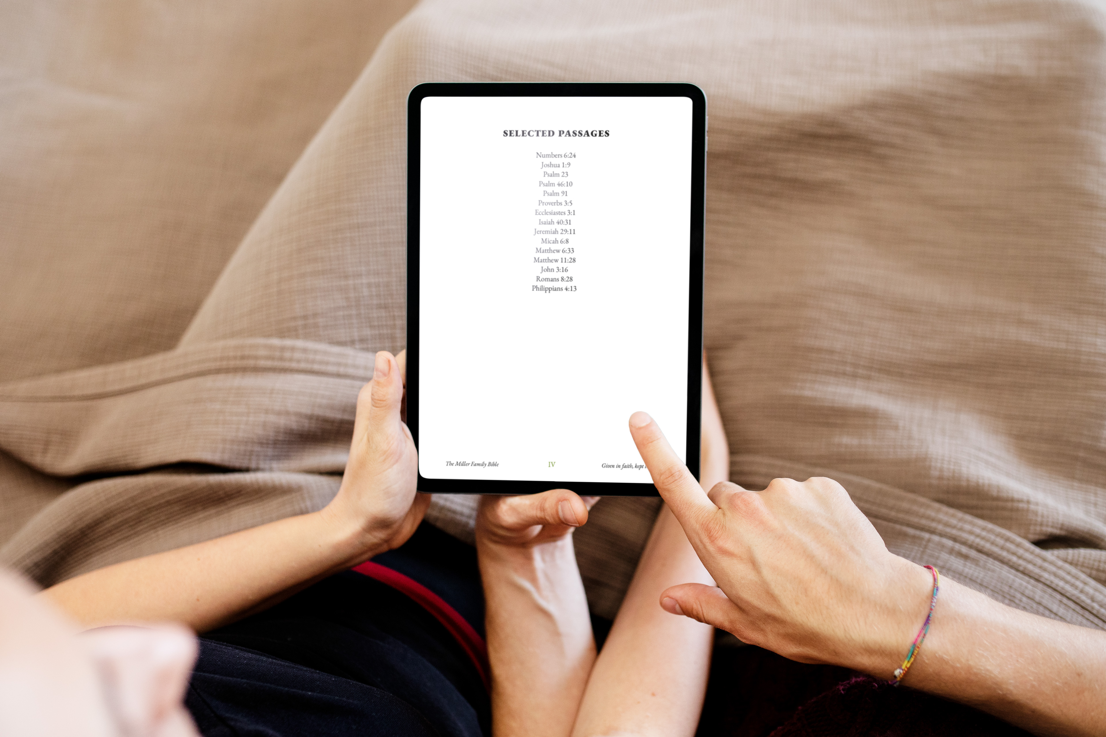 Person viewing Selected Passages index on tablet, showing list of favorite verses with custom footer